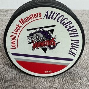 Lowell Lock Monsters AHL Defunct Team Official Hockey Puck Vintage